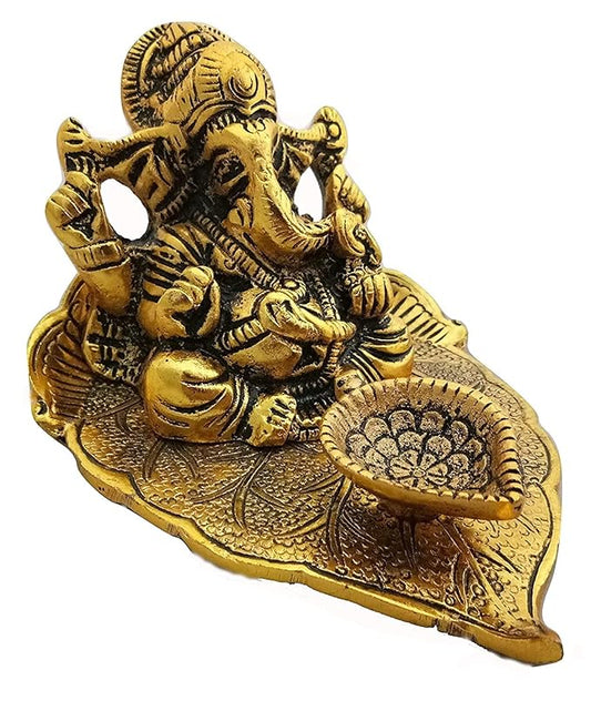 Handcrafted Metal Ganesh Idol on Leaf | Lord Ganesha with Diya for Diwali Pooja, Temple